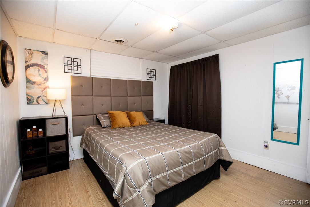 20 Mahan Road Farmville, VA 23901 - Photo 29 of 44 a bedroom with a bed and wall painting