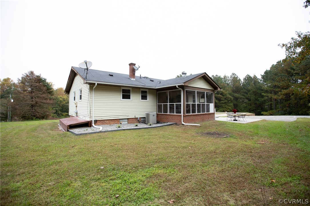 20 Mahan Road Farmville, VA 23901 - Photo 38 of 44 a view of a house with a backyard and a garden
