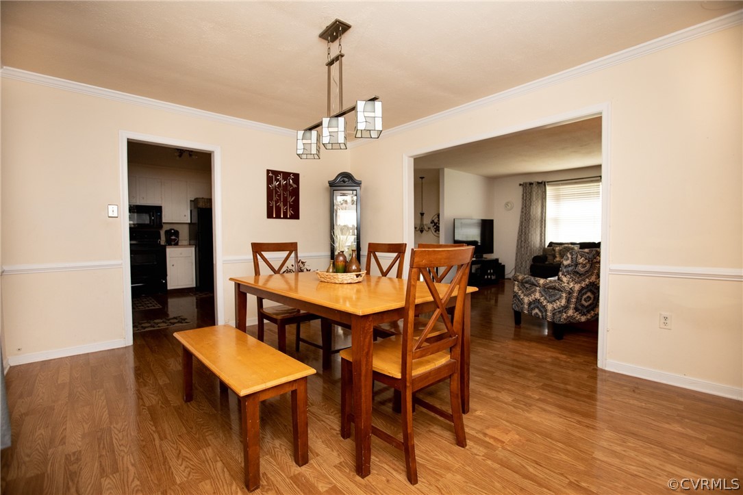 20 Mahan Road Farmville, VA 23901 - Photo 8 of 44 a view of a dining room with furniture and wooden floor
