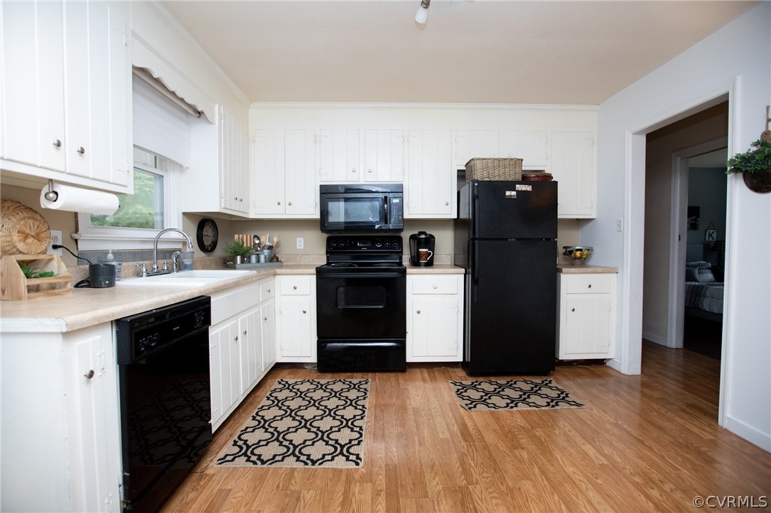 20 Mahan Road Farmville, VA 23901 - Photo 10 of 44 a kitchen with a refrigerator and cabinets