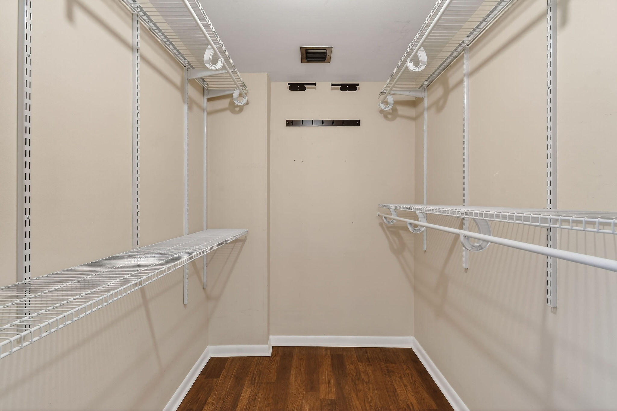336 Golfview Road, Unit 408 North Palm Beach, FL 33408 - Photo 13 of 39 a view of walk in closet with empty racks