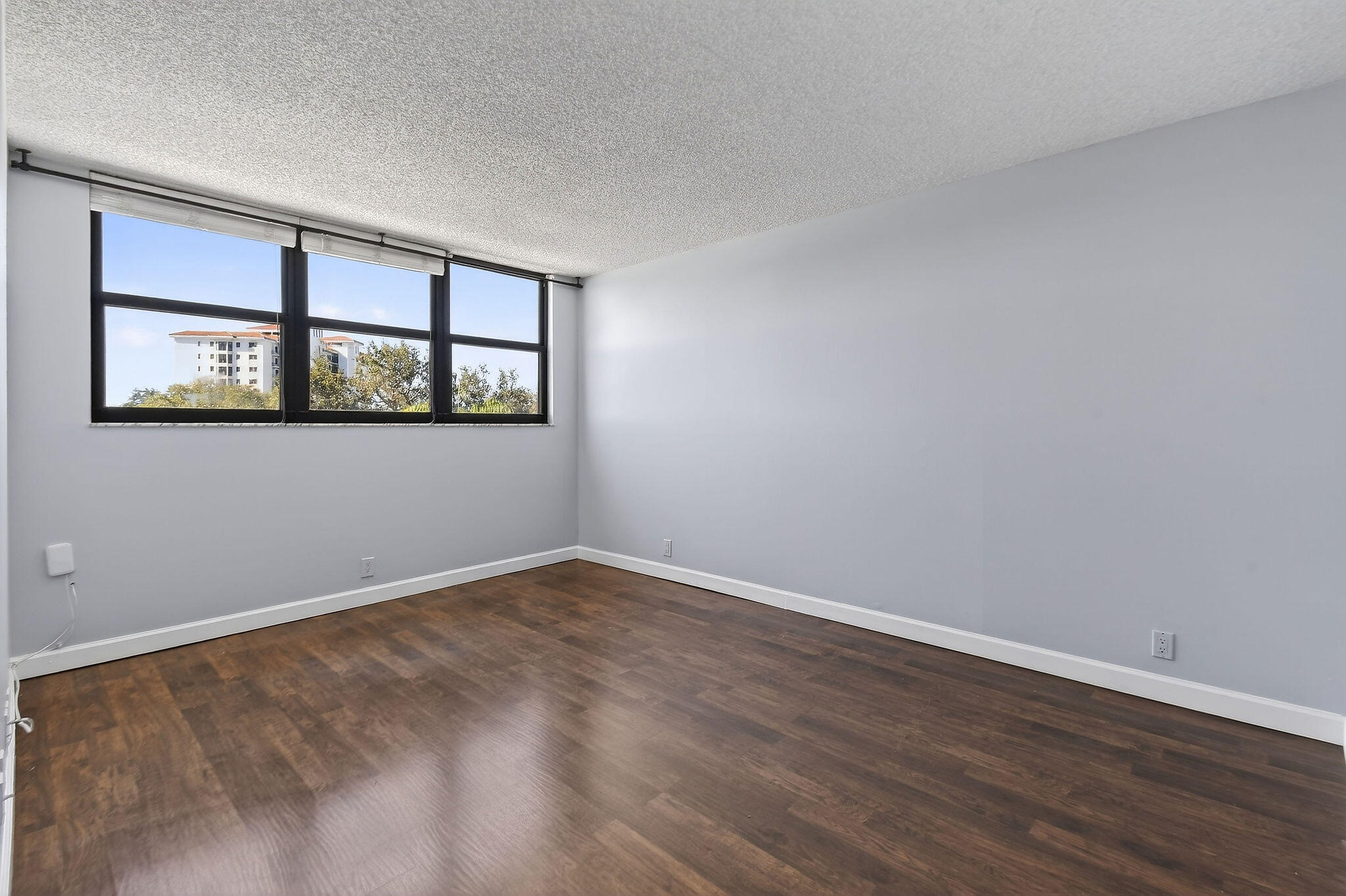 336 Golfview Road, Unit 408 North Palm Beach, FL 33408 - Photo 14 of 39 a view of an empty room with a window