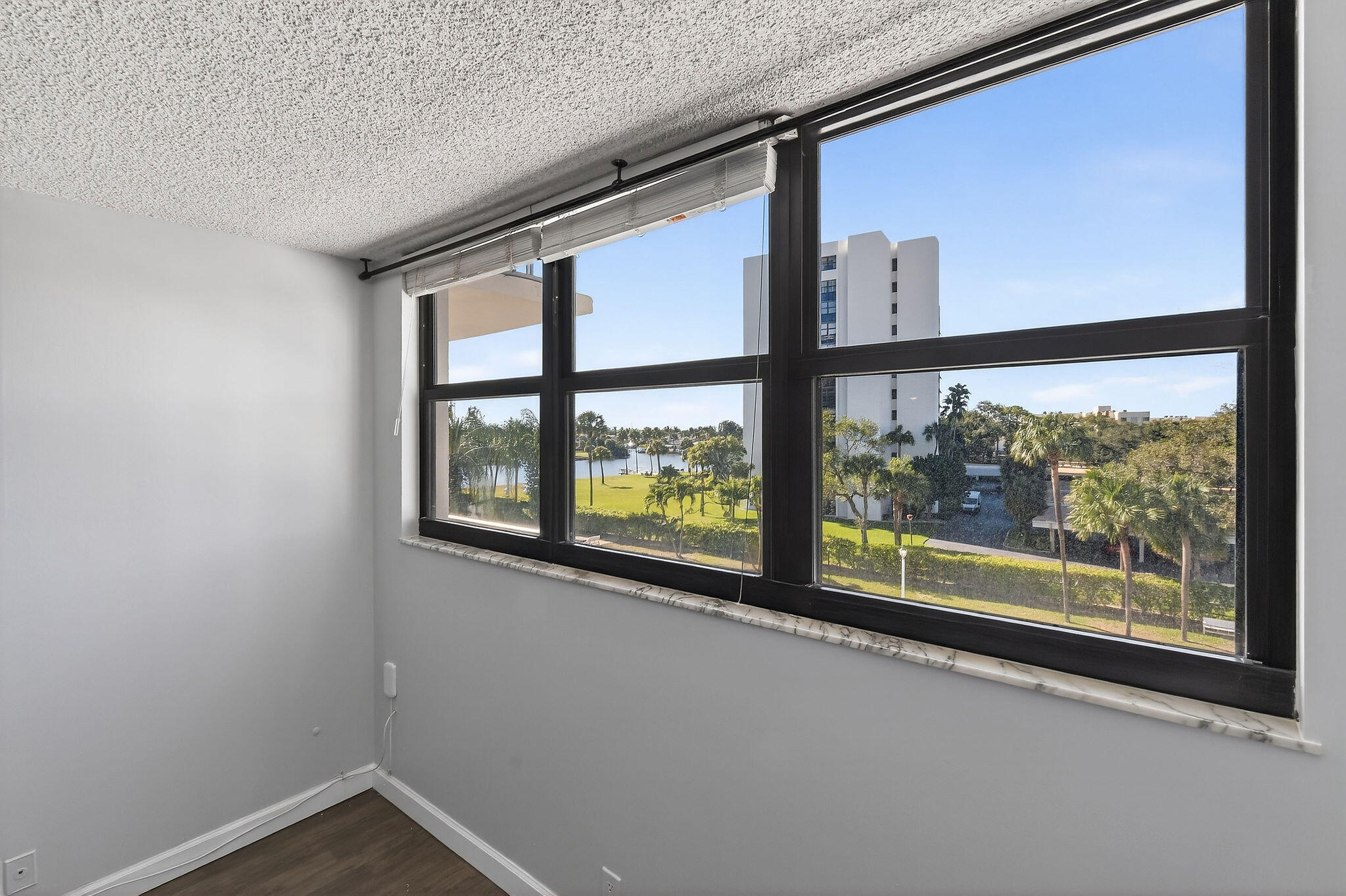 336 Golfview Road, Unit 408 North Palm Beach, FL 33408 - Photo 15 of 39 a view of a room with a large window