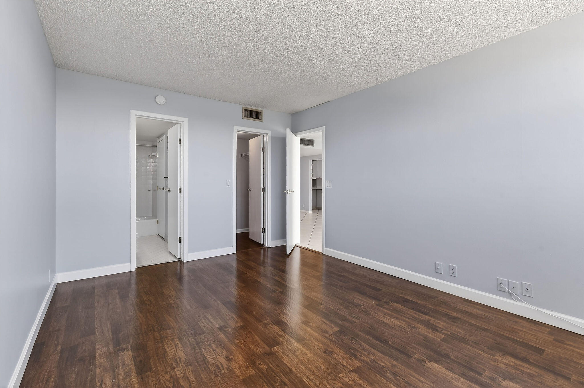336 Golfview Road, Unit 408 North Palm Beach, FL 33408 - Photo 16 of 39 a view of an empty room with wooden floor