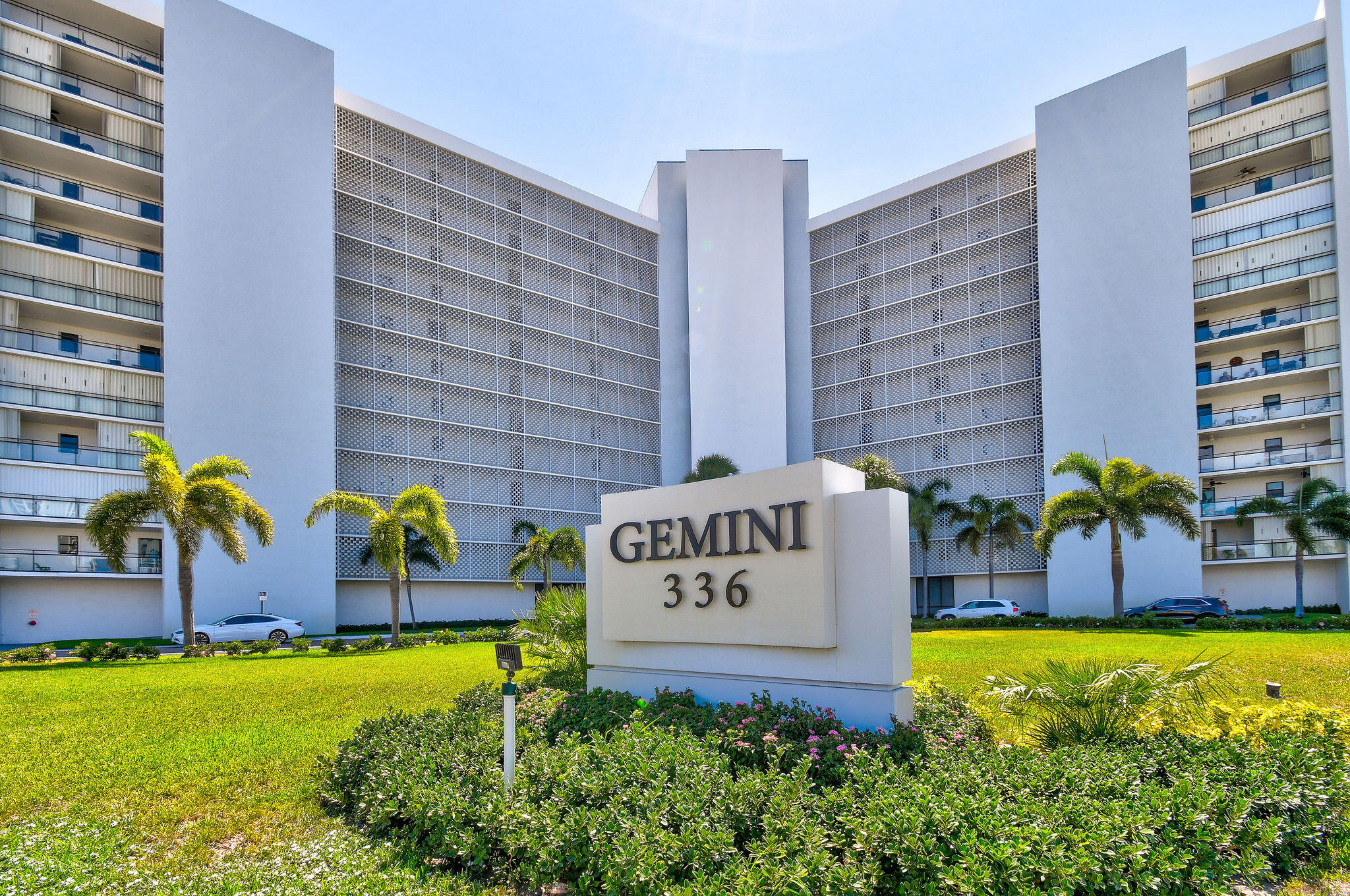 336 Golfview Road, Unit 408 North Palm Beach, FL 33408 - Photo 2 of 39 a sign on the side of building