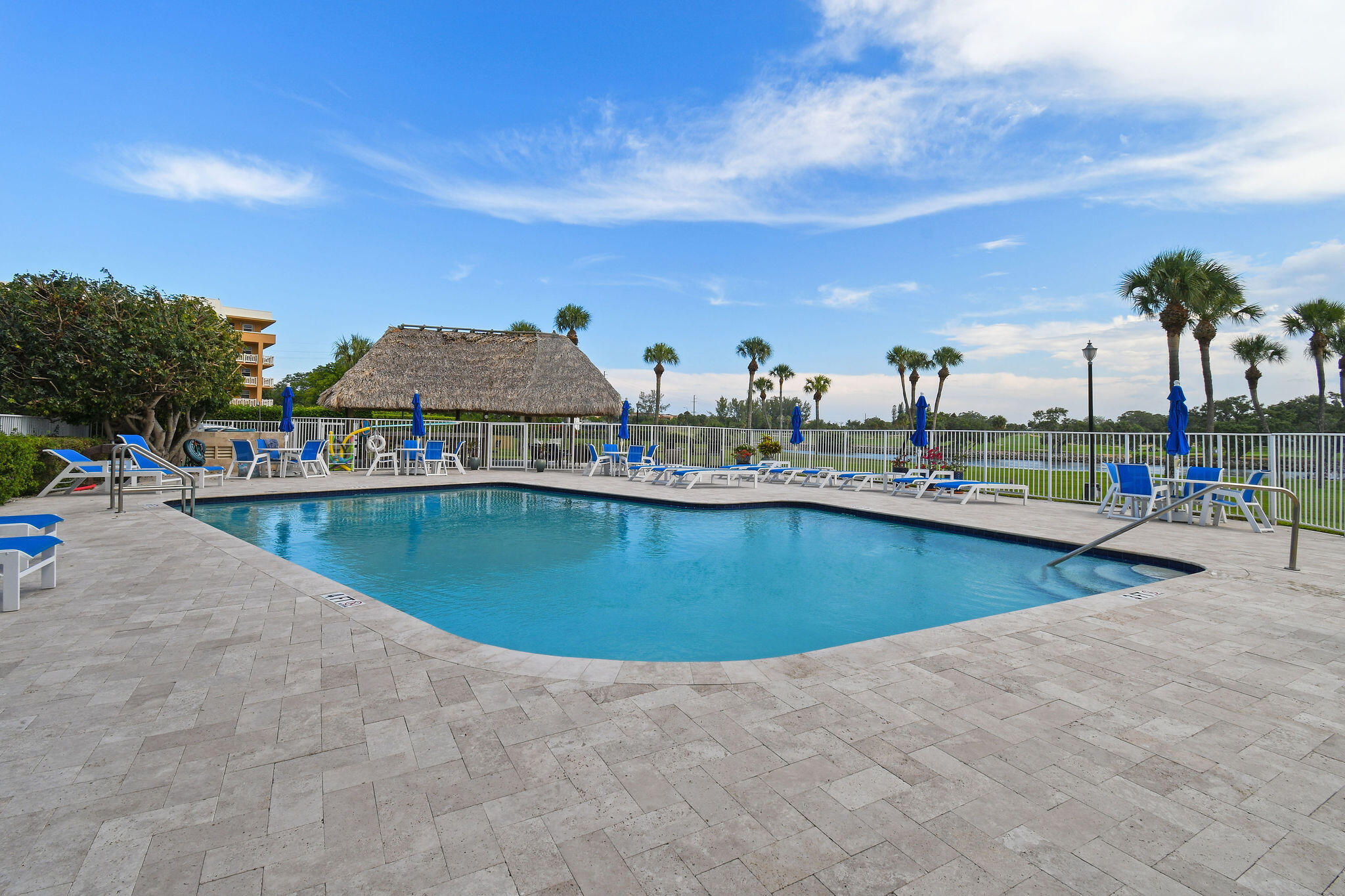 336 Golfview Road, Unit 408 North Palm Beach, FL 33408 - Photo 24 of 39 a view of swimming pool with outdoor seating