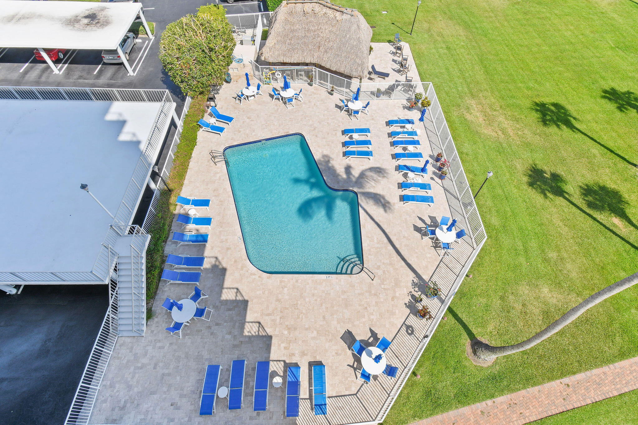 336 Golfview Road, Unit 408 North Palm Beach, FL 33408 - Photo 25 of 39 an aerial view of a house with a swimming pool