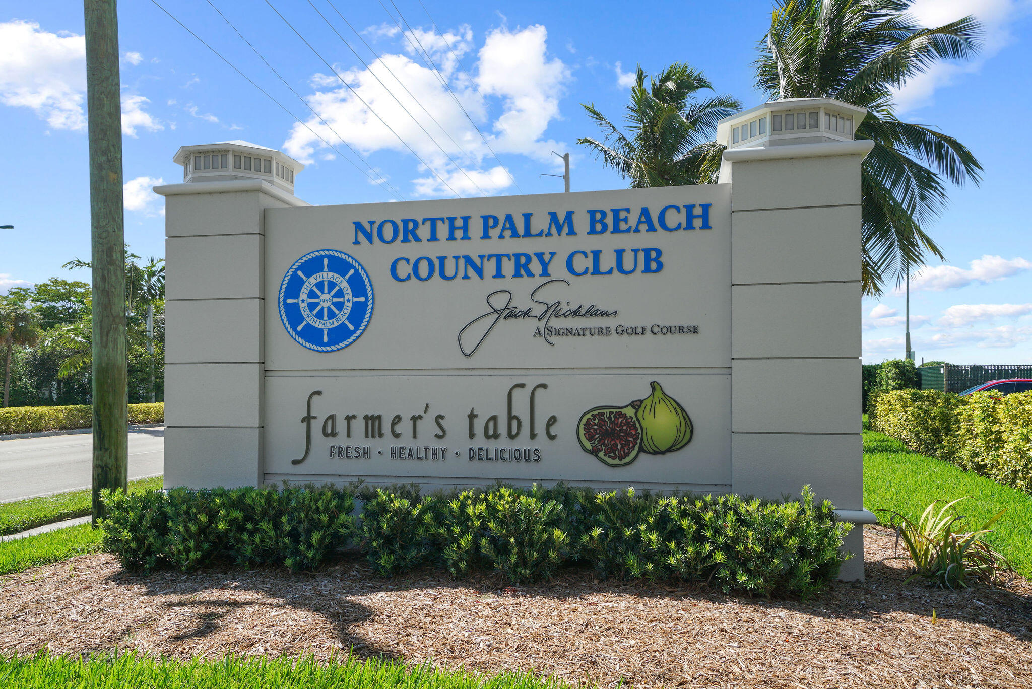 336 Golfview Road, Unit 408 North Palm Beach, FL 33408 - Photo 34 of 39 a sign on the side of a building