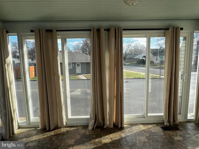 a kitchen with a stove and a refrigerator