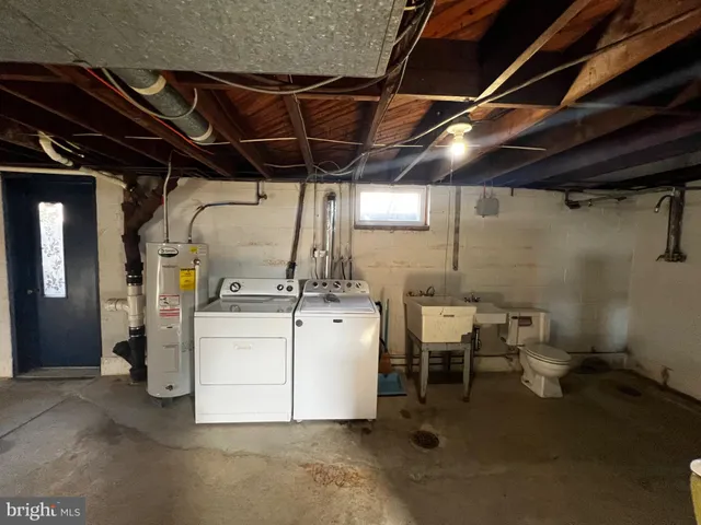 a view of a street with a yard