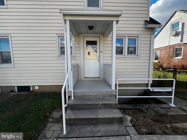 a view of a house with a white door