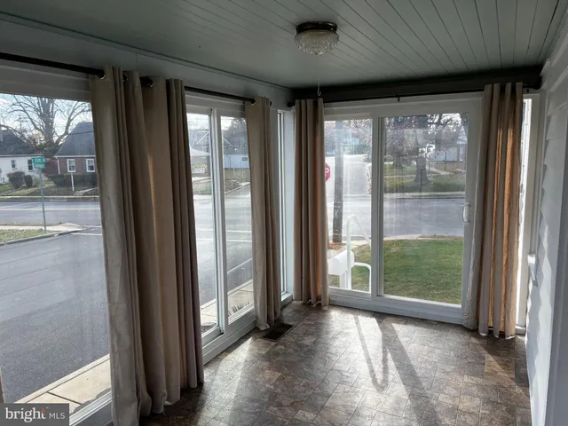 a view of a large window with an outdoor space