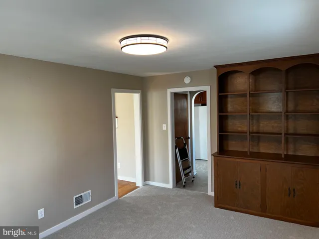 an empty room with closet