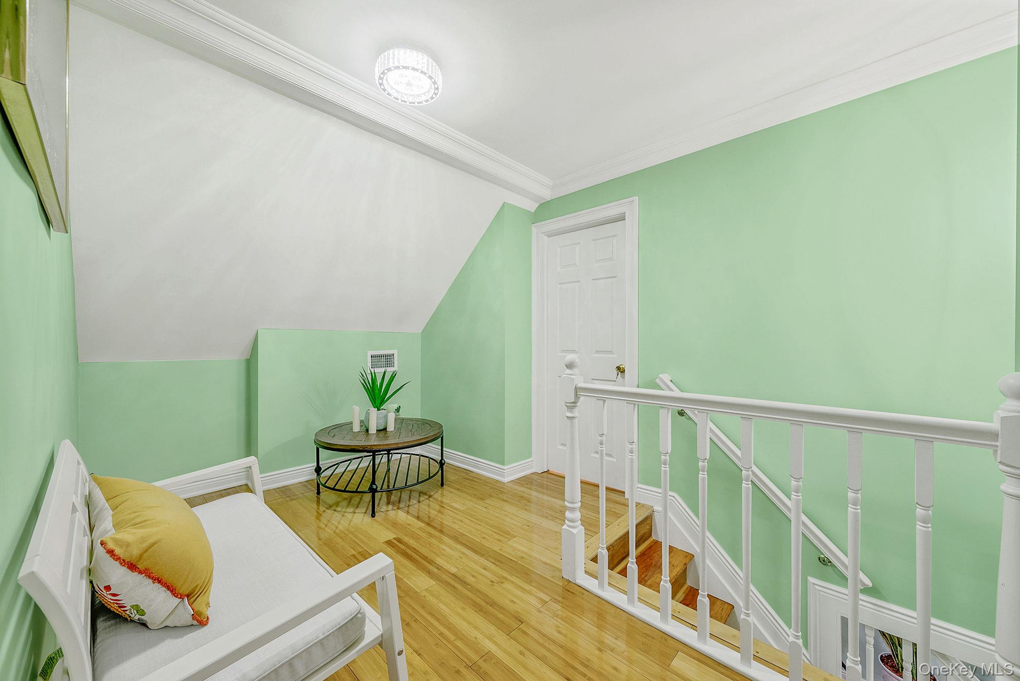 20 Howe Road Coram, NY 11727 - Photo 12 of 25 a living room with furniture and wooden floor
