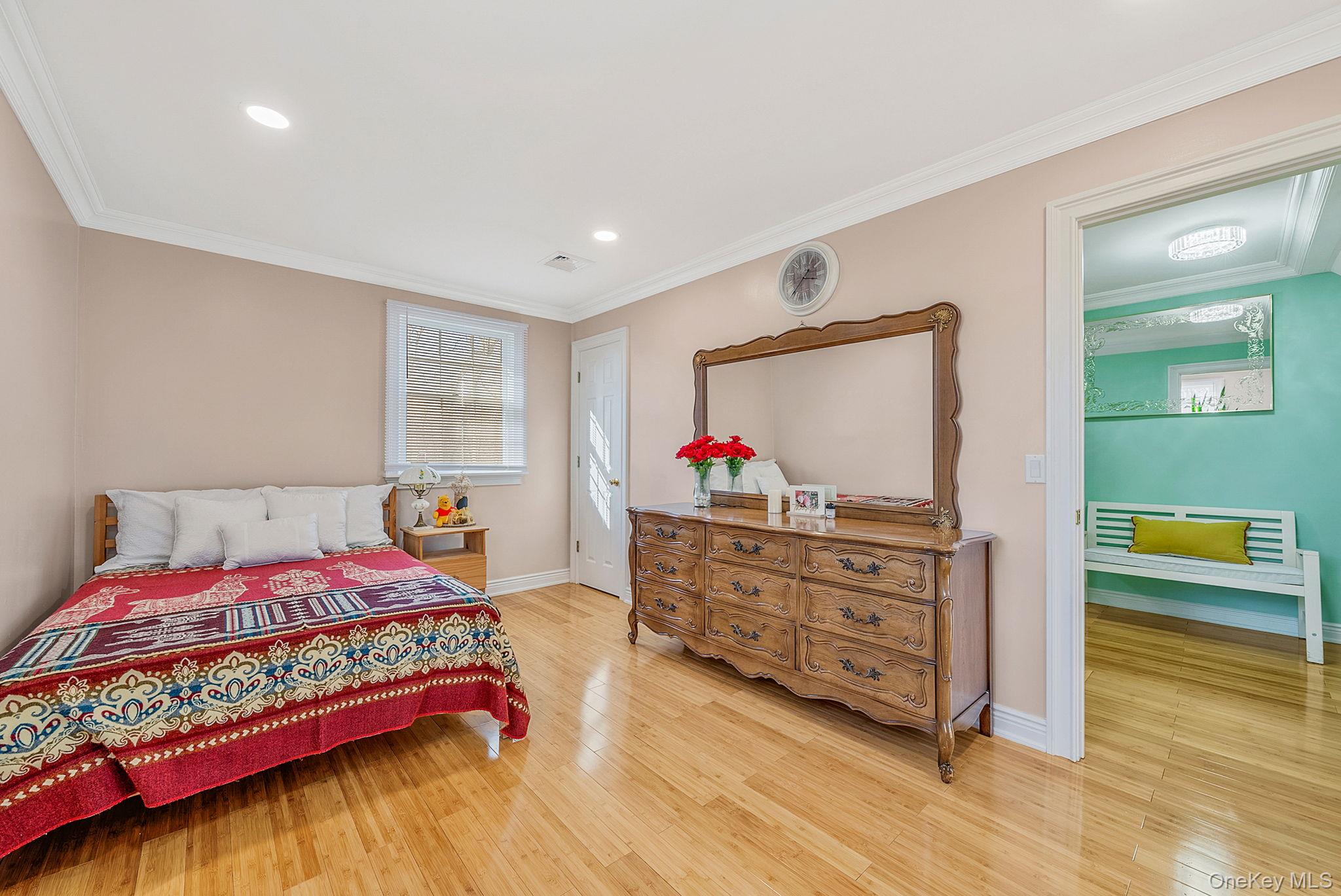 20 Howe Road Coram, NY 11727 - Photo 13 of 25 a bedroom with a bed and a view of bedroom