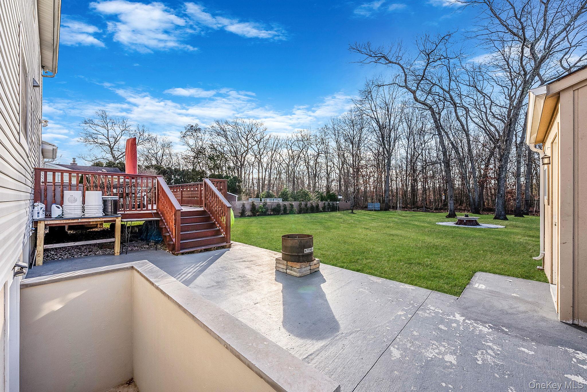 20 Howe Road Coram, NY 11727 - Photo 20 of 25 a view of a park with iron fence