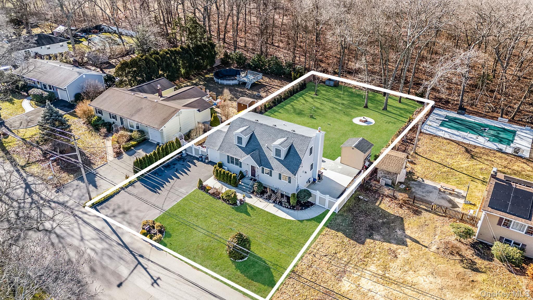 20 Howe Road Coram, NY 11727 - Photo 23 of 25 an aerial view of a house
