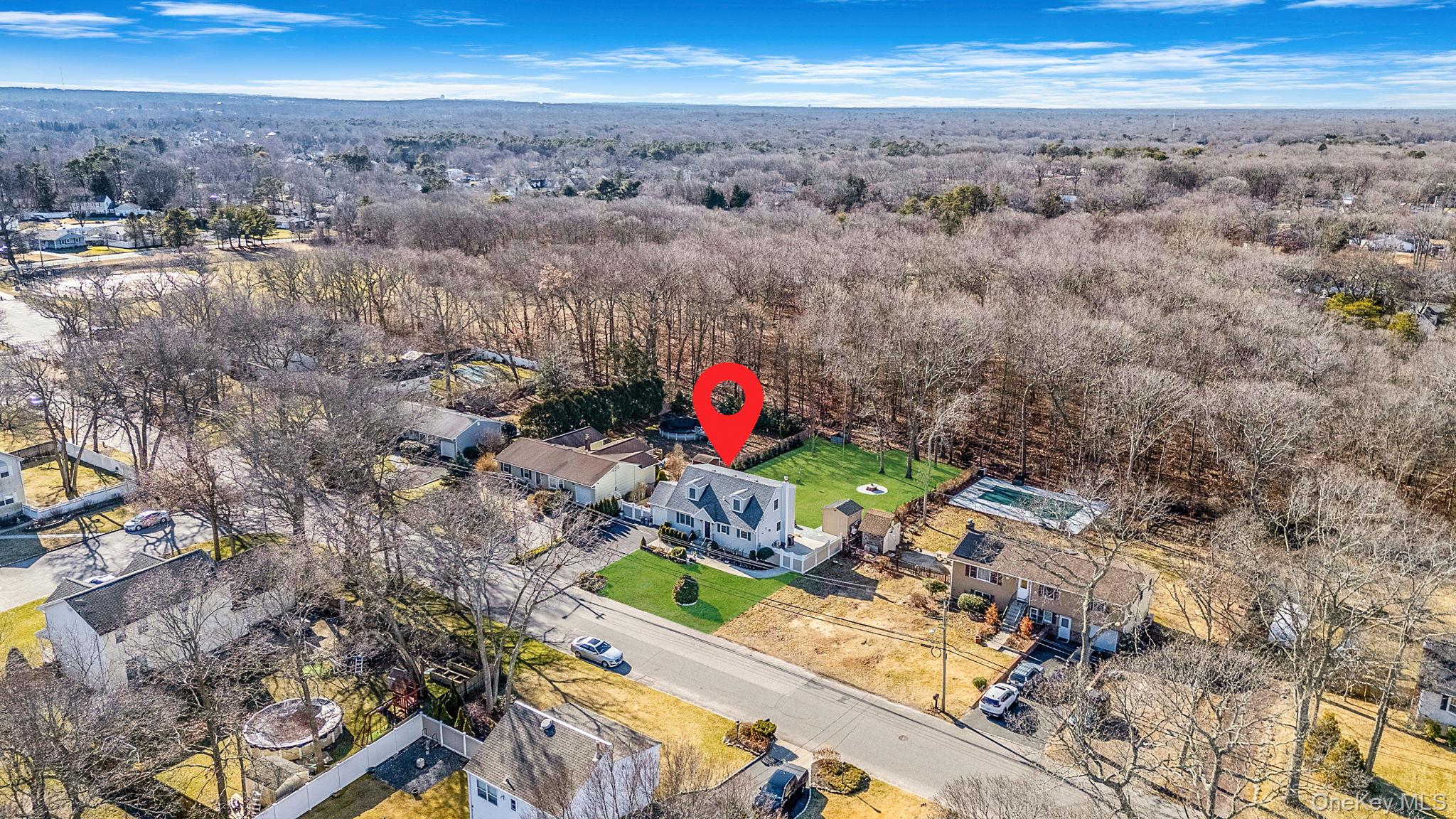 20 Howe Road Coram, NY 11727 - Photo 24 of 25 an aerial view of residential houses with outdoor space