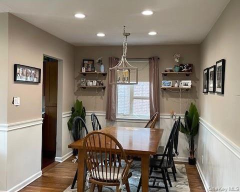 415 Main Street, Unit 101B Huntington, NY 11743 - Photo 5 of 10 a view of a dining room with furniture