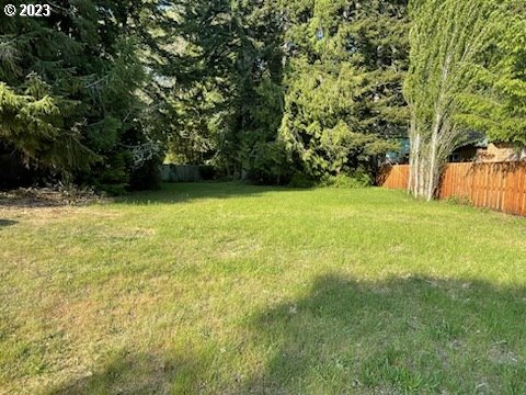 Munsel Lake, Unit TL100 Florence, OR 97439 - Photo 1 of 20 a view of a yard with a trees