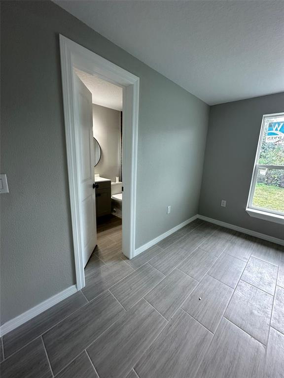 2015 Laurel Street Bartow, FL 33830 - Photo 11 of 18 a view of a room with wooden floor and a window