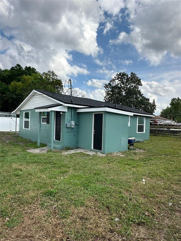 2015 Laurel Street Bartow, FL 33830 - Photo 18 of 18 a house with green field in front of it