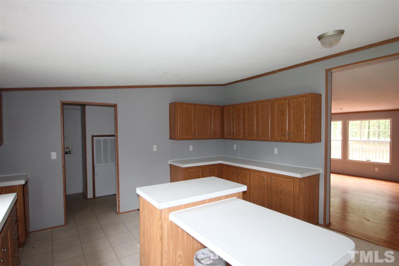 400 Neal's Store Road Roxboro, NC 27574 - Photo 6 of 15 a utility room with dryer and washer