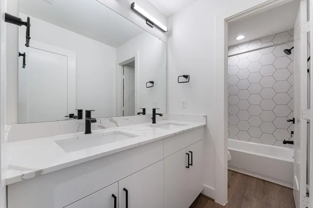 a bathroom with a sink and a bathtub