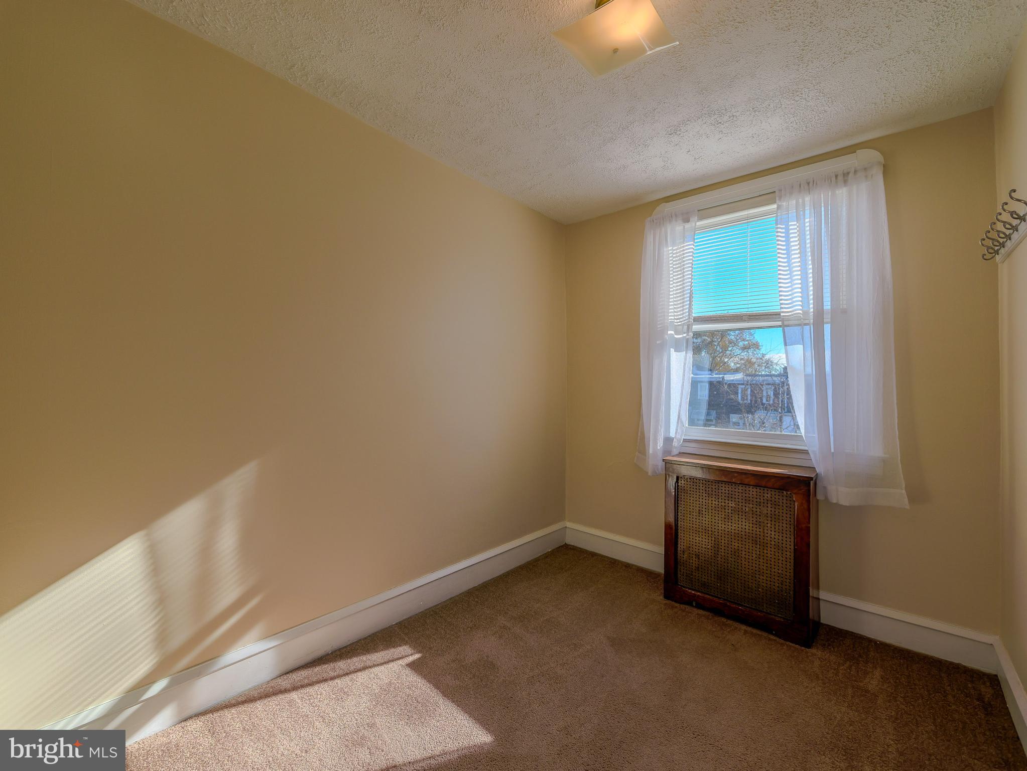 7154 Ruskin Lane Upper Darby, PA 19082 - Photo 17 of 28 a view of an empty room with a window