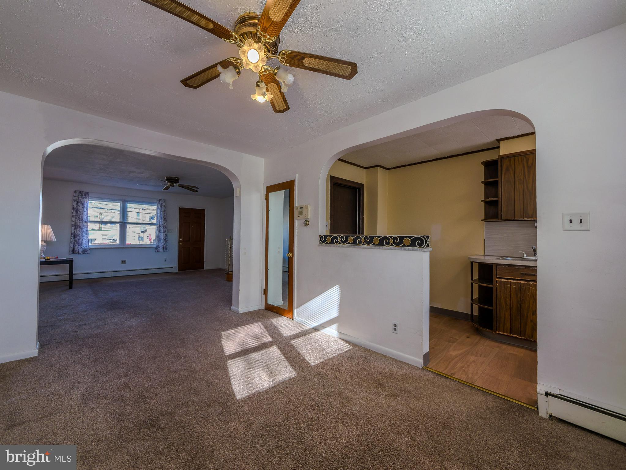 7154 Ruskin Lane Upper Darby, PA 19082 - Photo 6 of 28 a view of livingroom and kitchen with flat screen tv