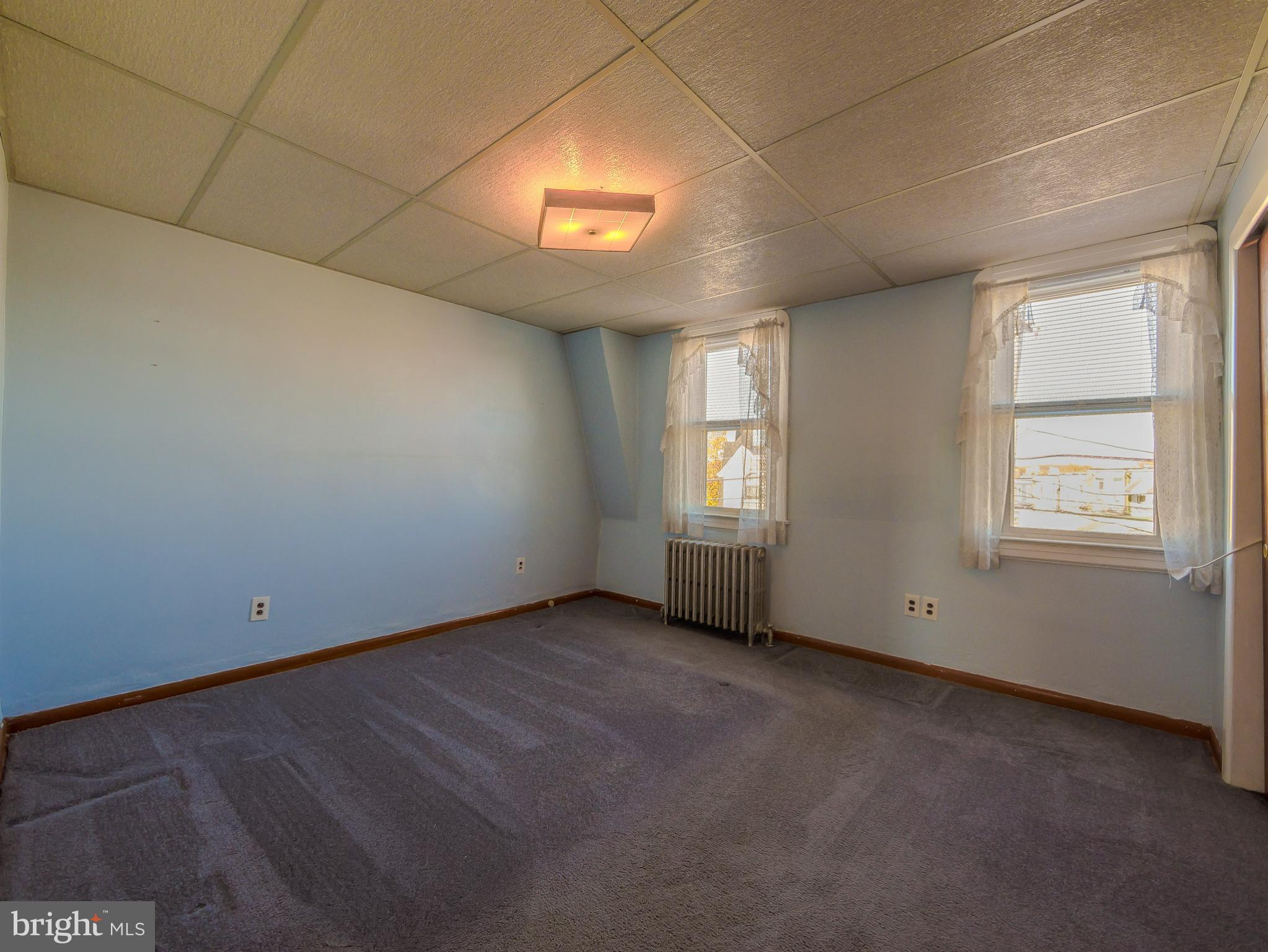 7154 Ruskin Lane Upper Darby, PA 19082 - Photo 10 of 28 an empty room with windows
