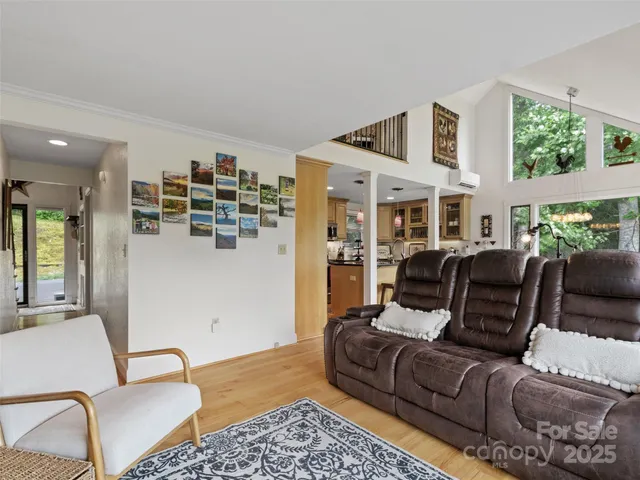 a living room with furniture and a table