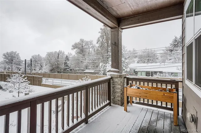 a picture of a bench in front of a wall