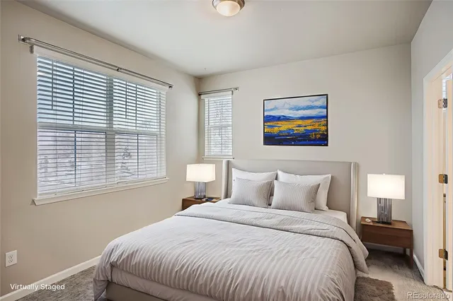 a bathroom with a sink mirror and vanity