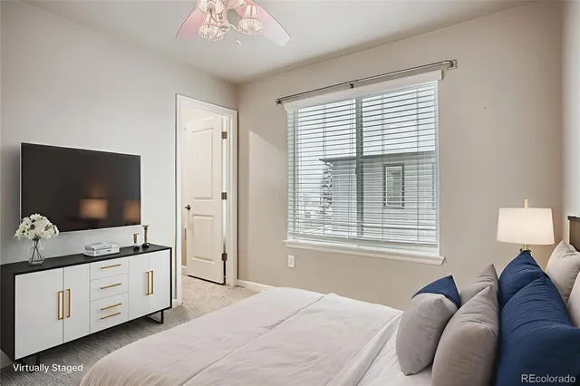a bathroom with a sink toilet and mirror