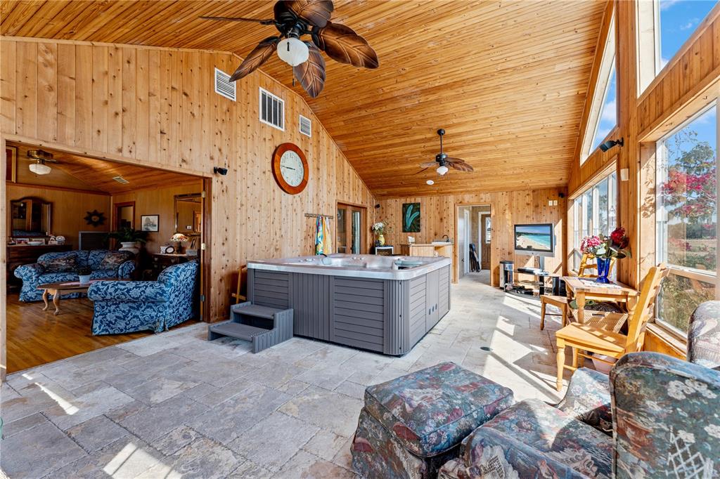 9504 Fort King Road Dade City, FL 33525 - Photo 11 of 14 a view of a chairs and tables in patio