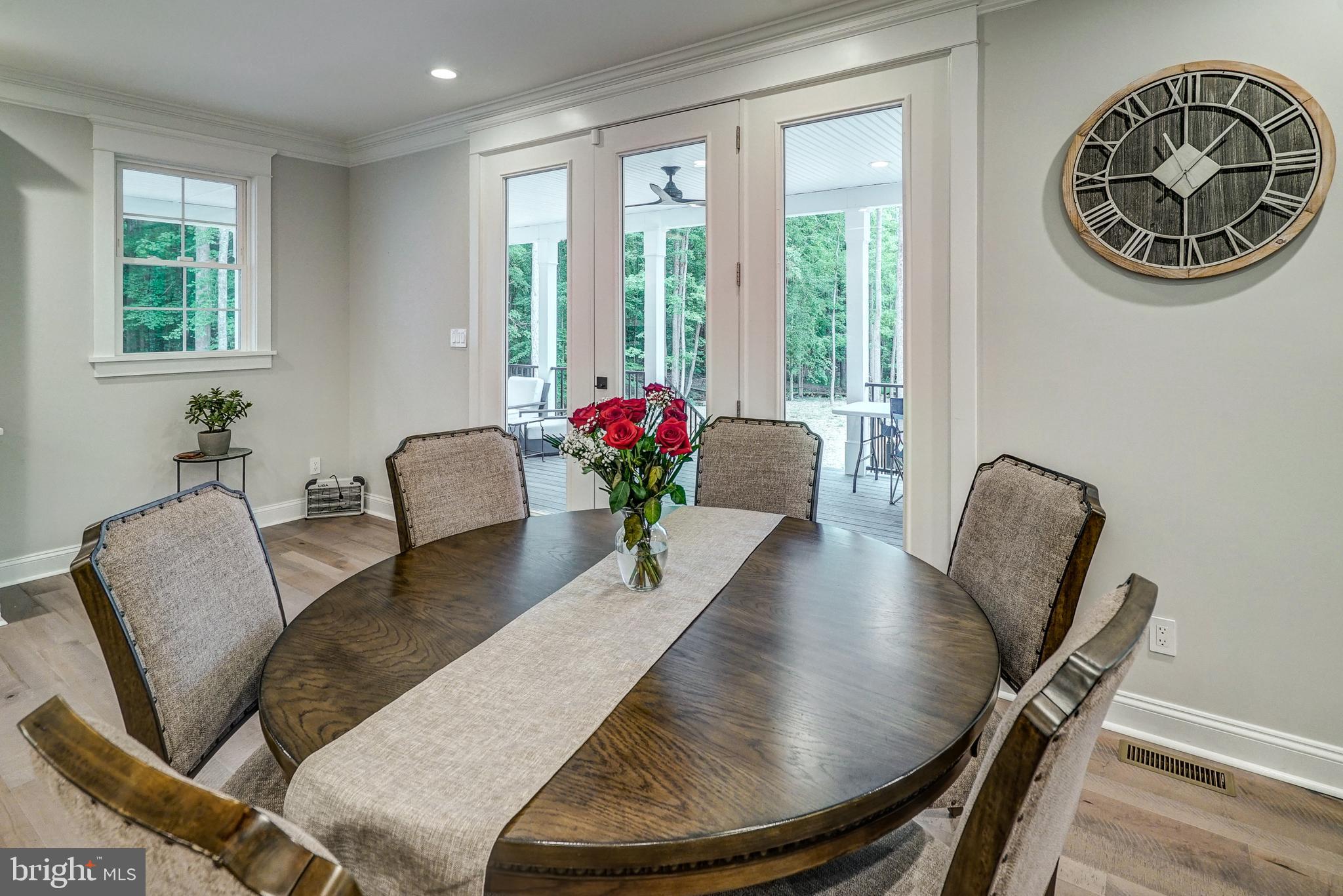 2935 A Minor Road Bumpass, VA 23024 - Photo 10 of 50 Dining Area with Crown Molding + Doors to Deck