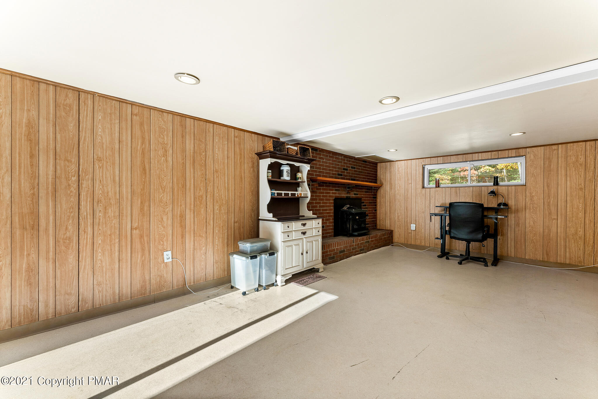 177 Tyrolean Way Henryville, PA 18332 - Photo 18 of 27 a view of a livingroom with furniture and a fireplace