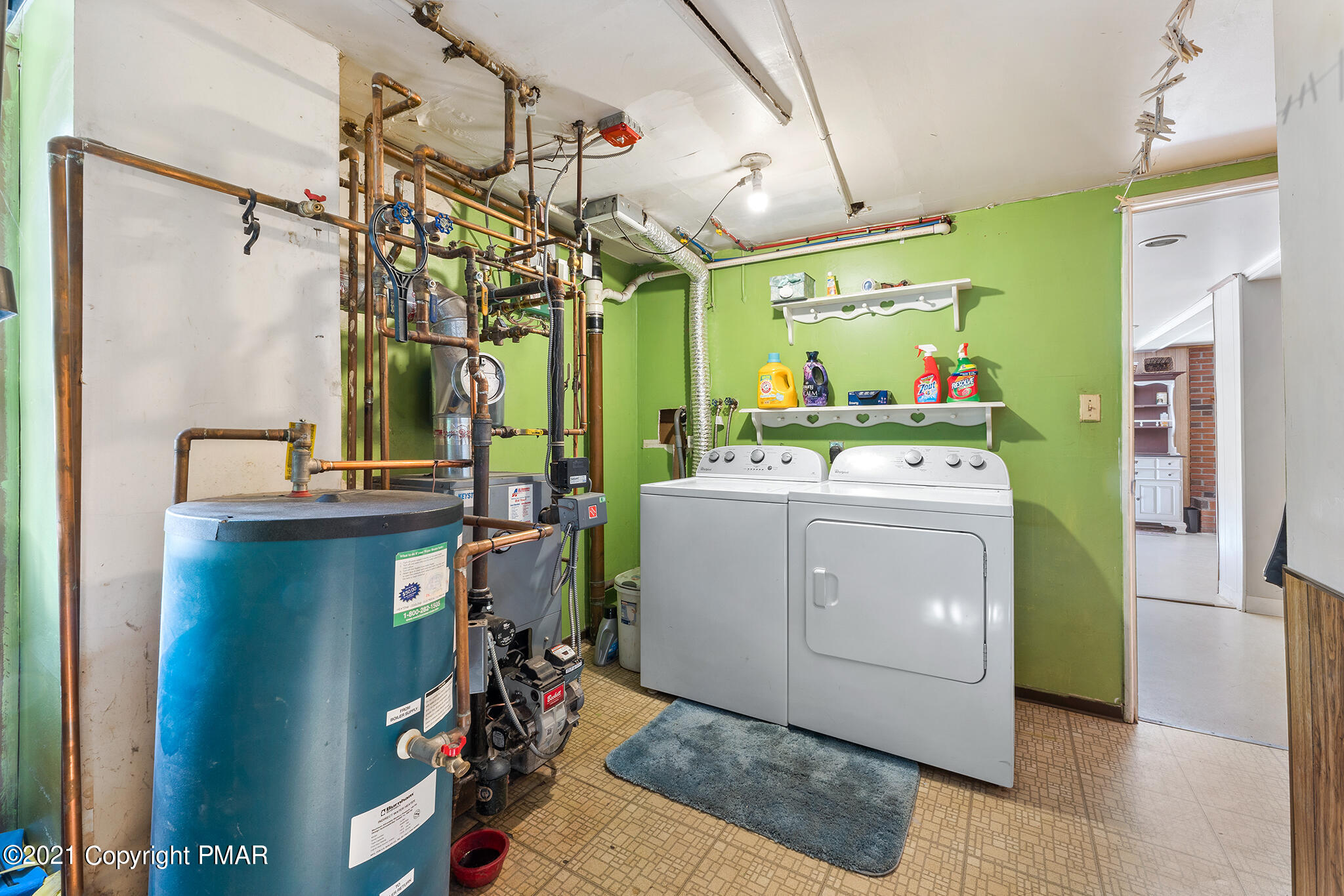 177 Tyrolean Way Henryville, PA 18332 - Photo 22 of 27 a utility room with cabinets dryer and washer