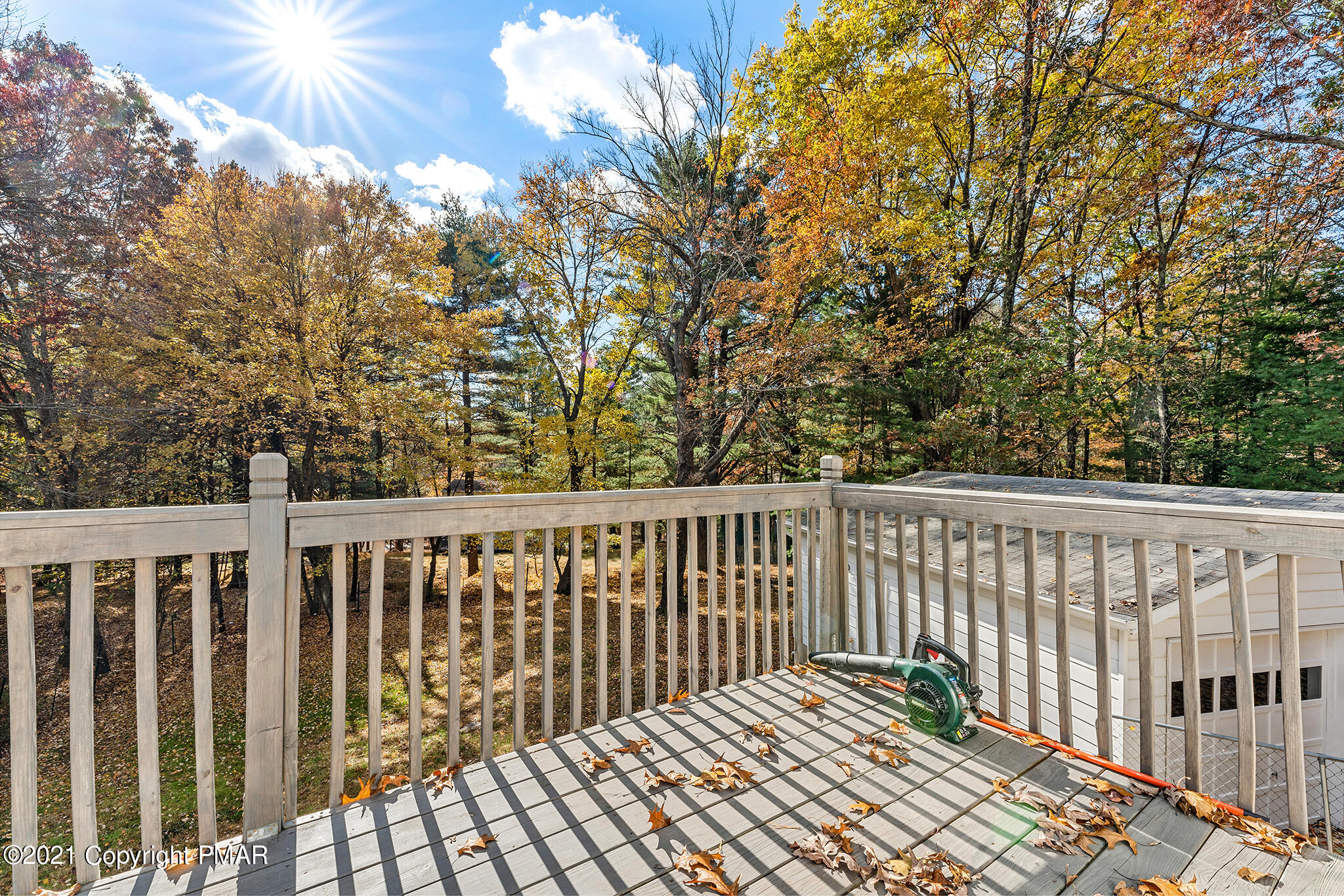 177 Tyrolean Way Henryville, PA 18332 - Photo 23 of 27 a balcony with wooden floor and fence