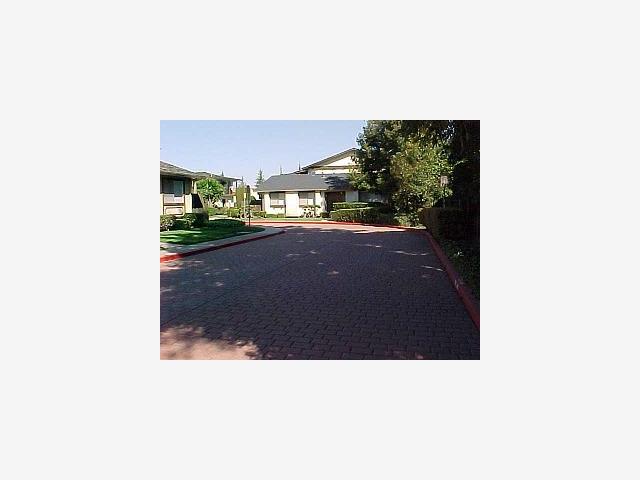 1047 Reed Terrace Sunnyvale, CA 94086 - Photo 2 of 3 a picture of a person on a street