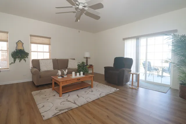a dining room with furniture window wooden floor