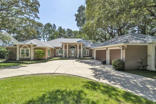 a view of wooden balcony with ocean