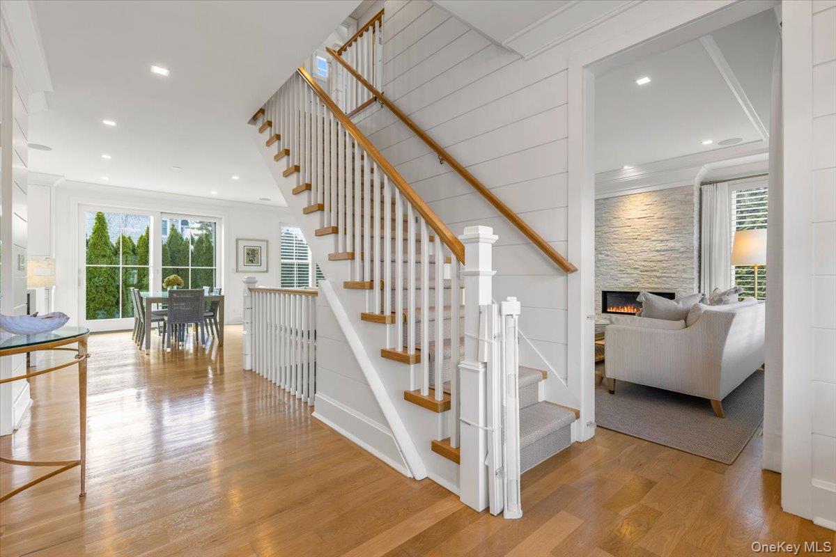 100 Dearborn Avenue Rye, NY 10580 - Photo 3 of 49 The entrance foyer offers views into the living room, dining room, and eat-in kitchen.