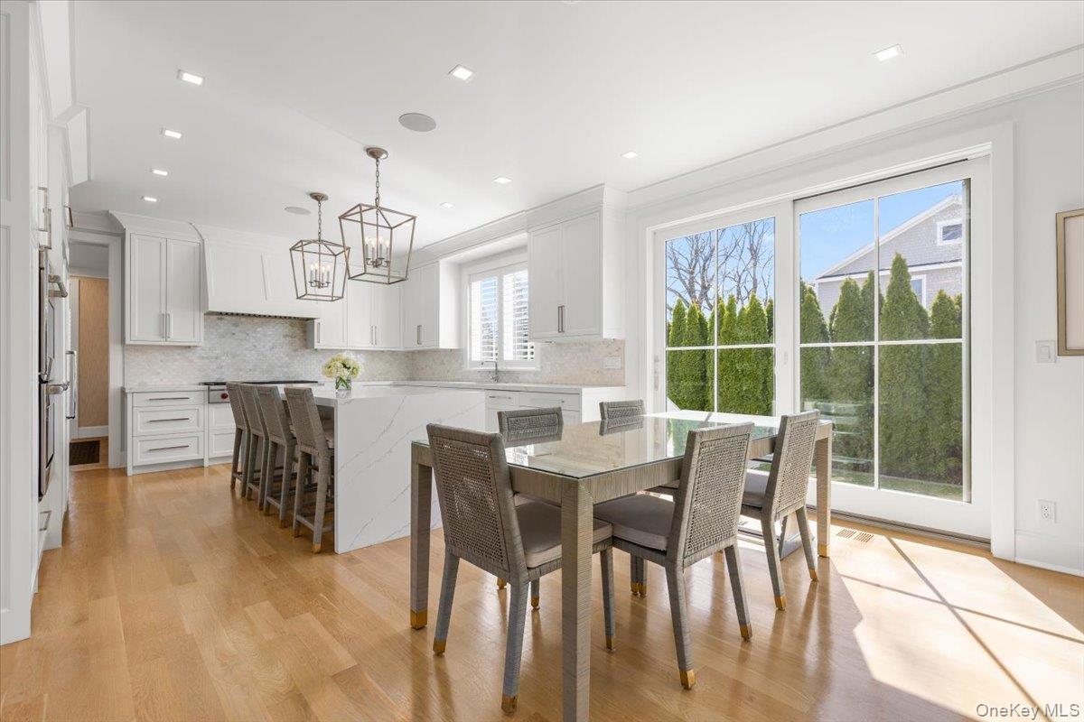 100 Dearborn Avenue Rye, NY 10580 - Photo 9 of 49 The eat-in kitchen features island seating as well as an additional casual dining space.