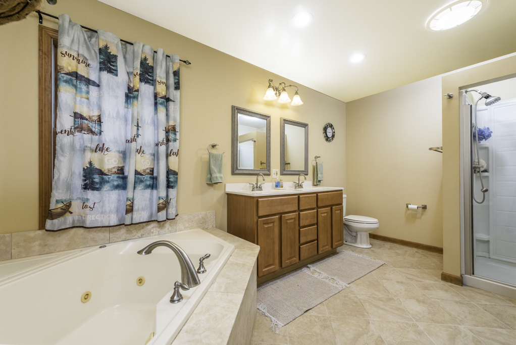 35861 North Fuller Road Gurnee, IL 60031 - Photo 15 of 30 a spacious bathroom with a double vanity sink mirror and double