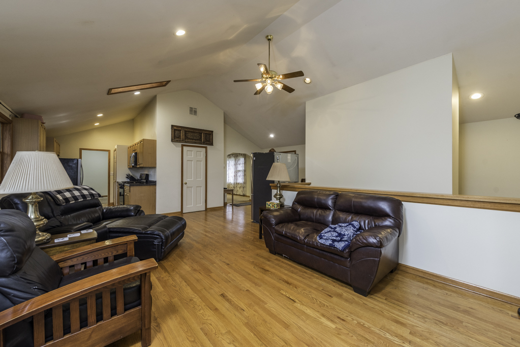 35861 North Fuller Road Gurnee, IL 60031 - Photo 4 of 30 a living room with furniture and a chandelier