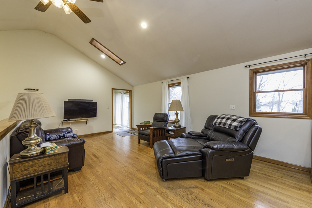 35861 North Fuller Road Gurnee, IL 60031 - Photo 5 of 30 a living room with furniture and a flat screen tv