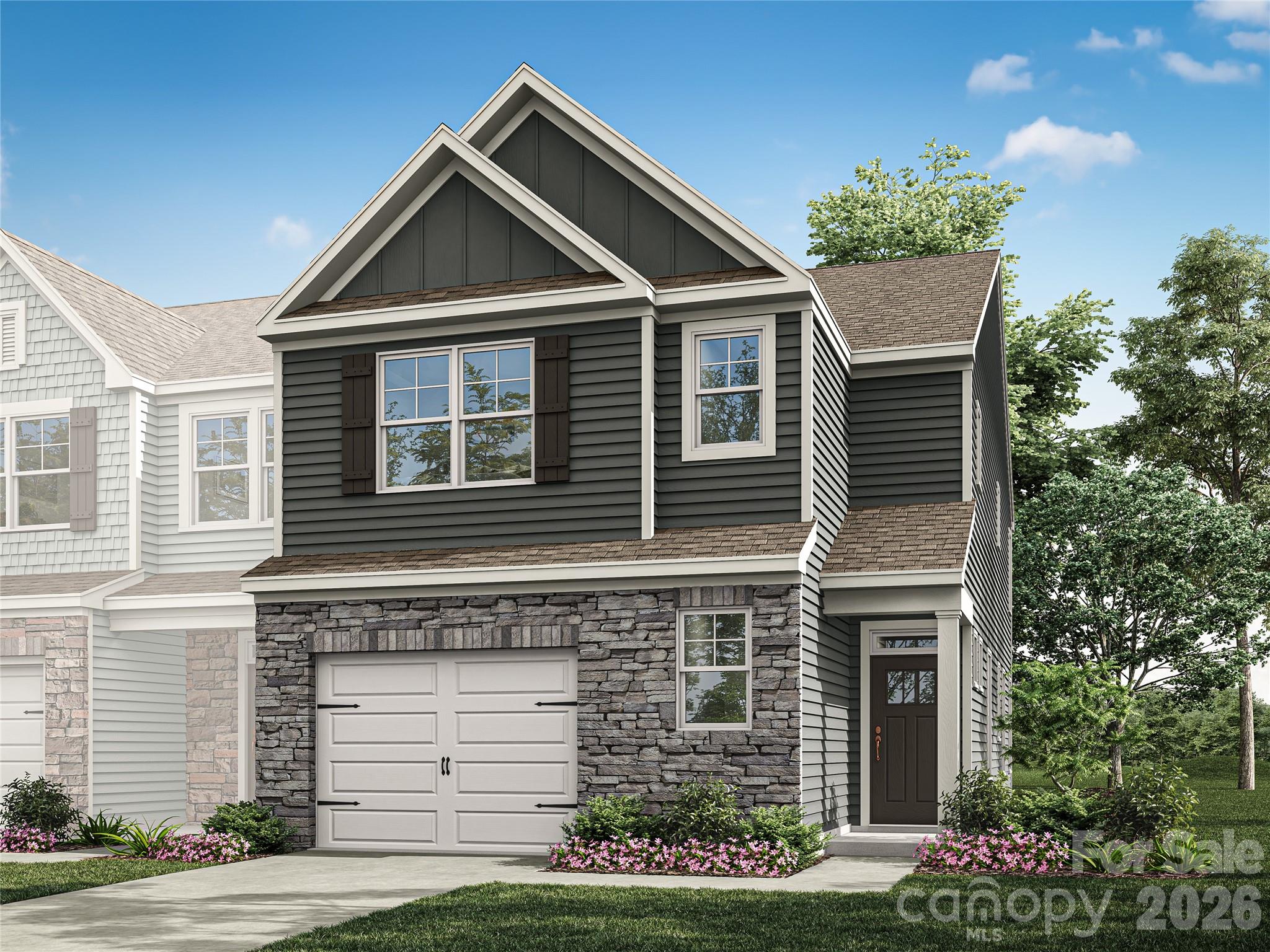 215 Viburnum Road Waxhaw, NC 28173 - Photo 1 of 1 a front view of a house with garden