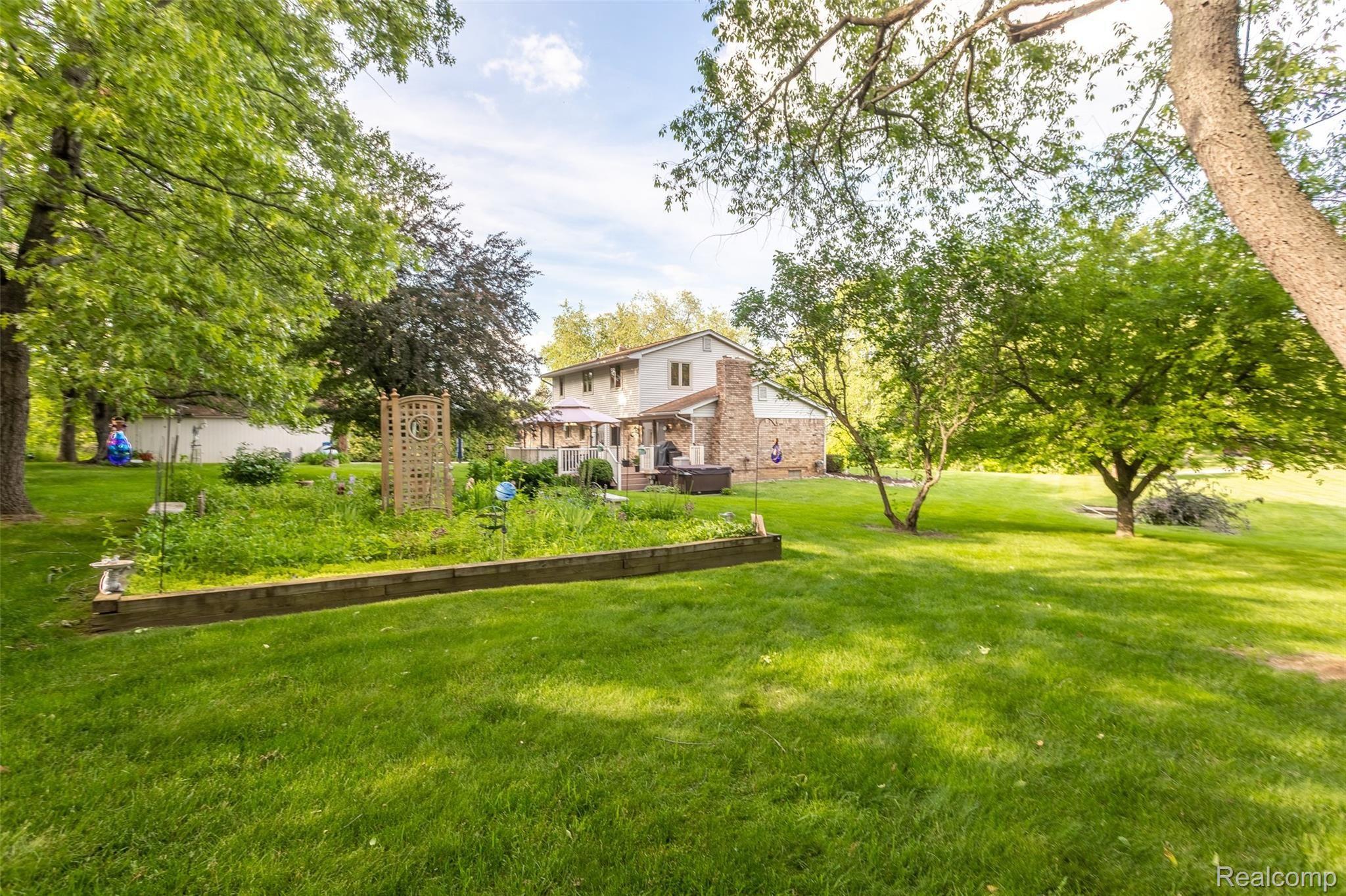 905 Gulley Road Howell, MI 48843 - Photo 45 of 52 20 x 30 perennial garden